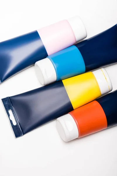 Top view of acrylic paint tubes on white background — Stock Photo