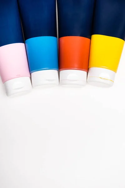 Top view of acrylic paint tubes on white background — Stock Photo