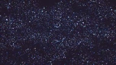 Mavi Glitter parçacıklar arka plan. Sorunsuz döngü.