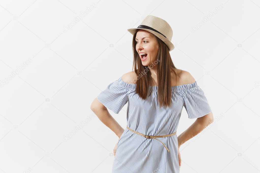 Young tender elegant charming woman dressed blue dress, cute hat with long brunette hair posing isolated on white background. People, sincere emotions, lifestyle concept. Advertising area. Copy space