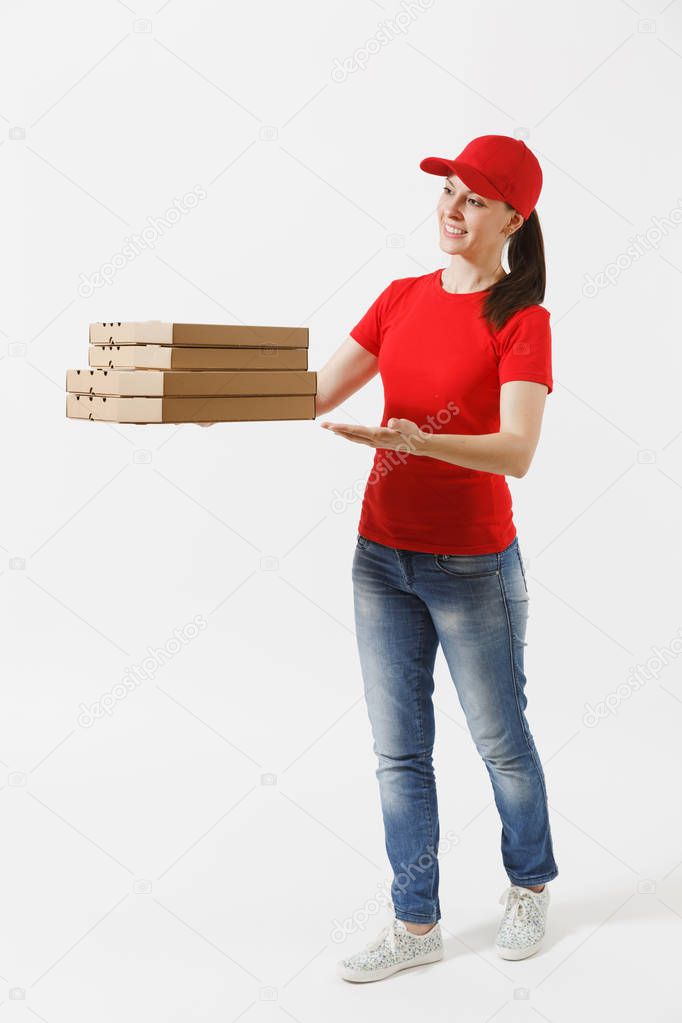 Full length portrait of happy woman in red cap, t-shirt giving food order pizza boxes isolated on white background. Female courier holding italian pizza in cardboard flatbox. Delivery service concept