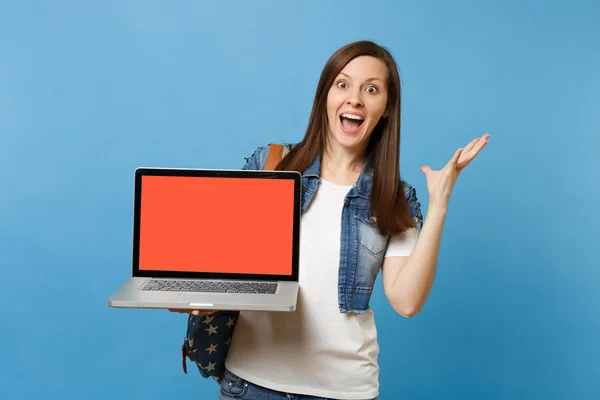 Young Excited Woman Student Opened Mouth Spreading Hands Holding Laptop — Stock Photo, Image