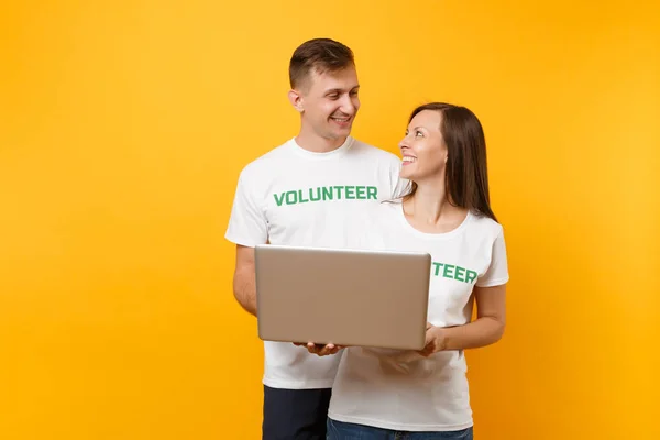 Colleagues Couple White Shirt Inscription Green Volunteer Using Typing Laptop — Stock Photo, Image