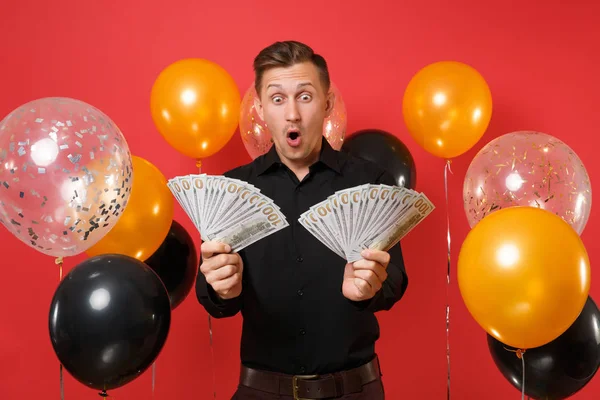 Shocked Amazed Young Man Black Classic Shirt Holding Bundle Lots — Stock Photo, Image