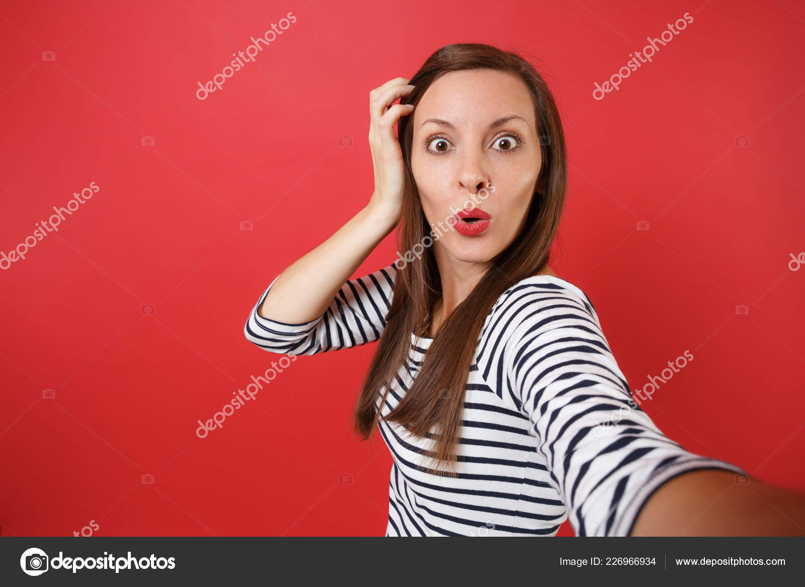  Close Selfie Shot Shocked Young Woman Striped Clothes Keeping Hand ...
