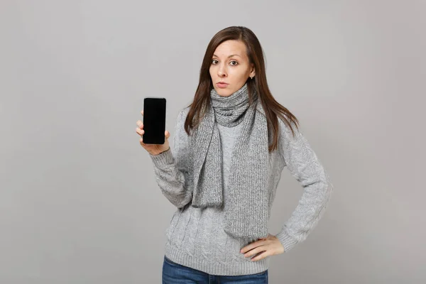 Young Woman Gray Sweater Scarf Holding Mobile Phone Blank Empty — Stock Photo, Image