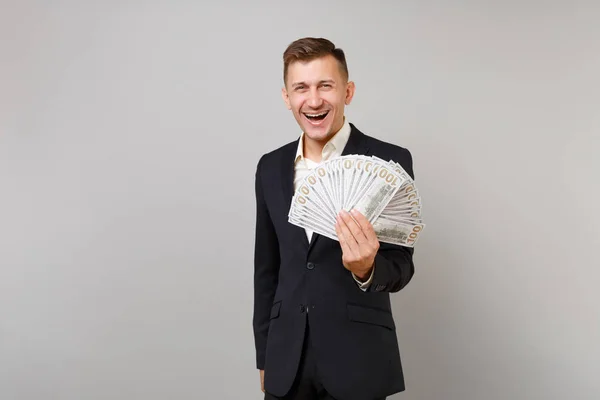 Lachender Junger Geschäftsmann Klassischen Schwarzen Anzug Hemd Mit Vielen Dollarnoten — Stockfoto