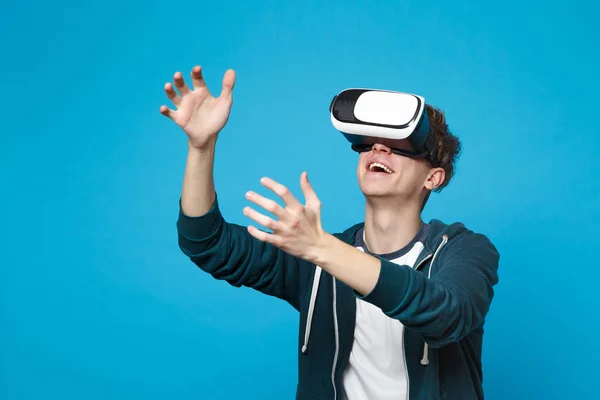 Smiling young man looking on headset touch something like push c — Stock Photo, Image