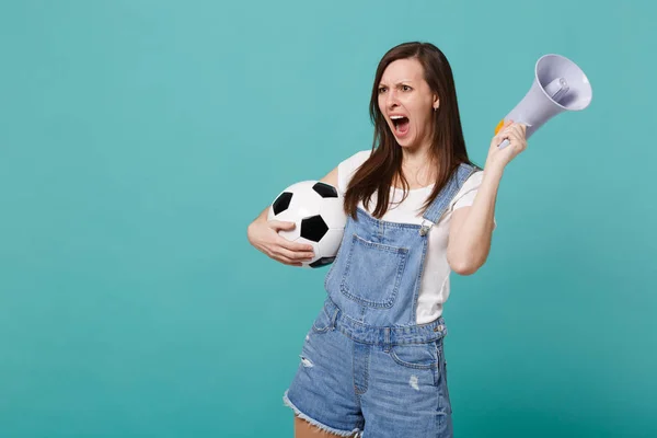Irritated young woman football fan support favorite team with so