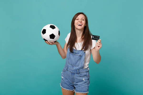 Joyful attractive young woman football fan support favorite team