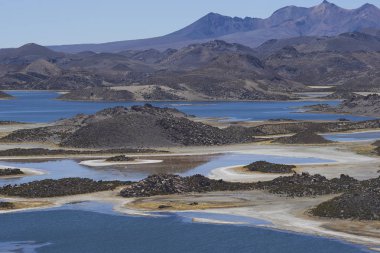 Lagunas de Cotacani in Lauca National Park high on the Altiplano of northern Chile. clipart