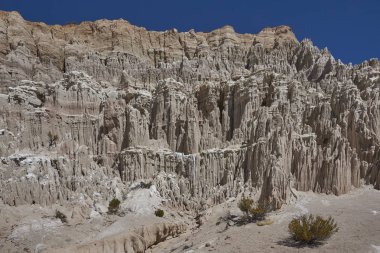 Eroded rock formations along Quebrada Chuba, a river valley high on the Altiplano of northern Chile in Lauca National Park. clipart