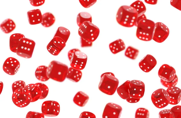 Red game dices threw in the air isolated on white background