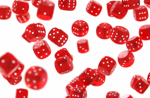 Random set of red game dices threw in the air isolated on white background