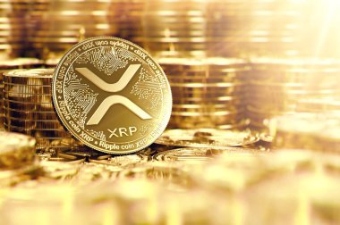 Altın dalgalanma Xrp yığını Mercek parlaması ile bulanık portre refah bir sembolü olarak sikke. 3D render