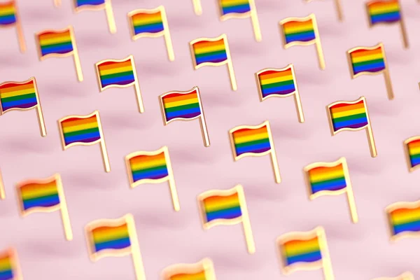 Wazige close-up focus op Rainbow LGBTQ vlaggen patroon. Juni de Gay Pride maand symbool concept. Geïsoleerd op pastel roze achtergrond. 3D-rendering — Stockfoto