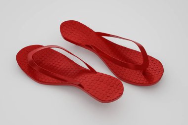 Beyaz arka plan üzerinde izole kırmızı parmak arası terlik 