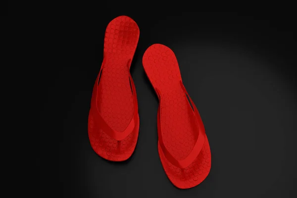 Red flip-flops isolated on black background — Stock Photo, Image