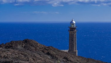 Faro de Orchilla deniz feneri, volkanik kayalar ve Alantik okyanus manzarası, El Pinar, El Hierro, Kanarya adaları, İspanya