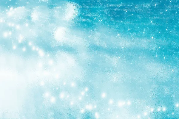 Abstract sparkling turquoise background. Beautiful christmas background