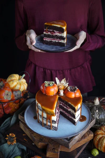Autumn Cake Persimmon Caramel Pumpkin Girl Burgundy Dress Black Background — Stock Photo, Image