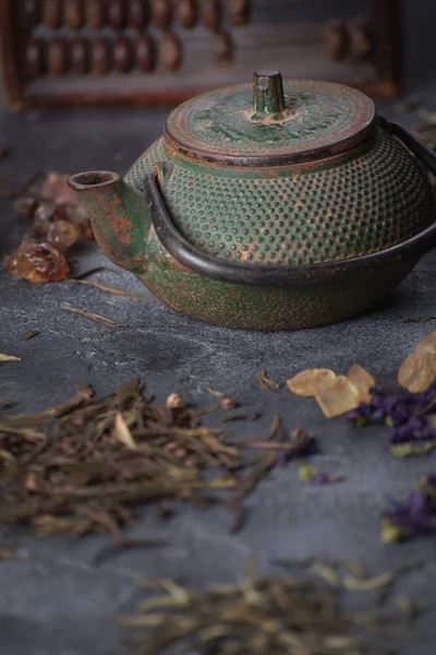 Green tea mix on dark background