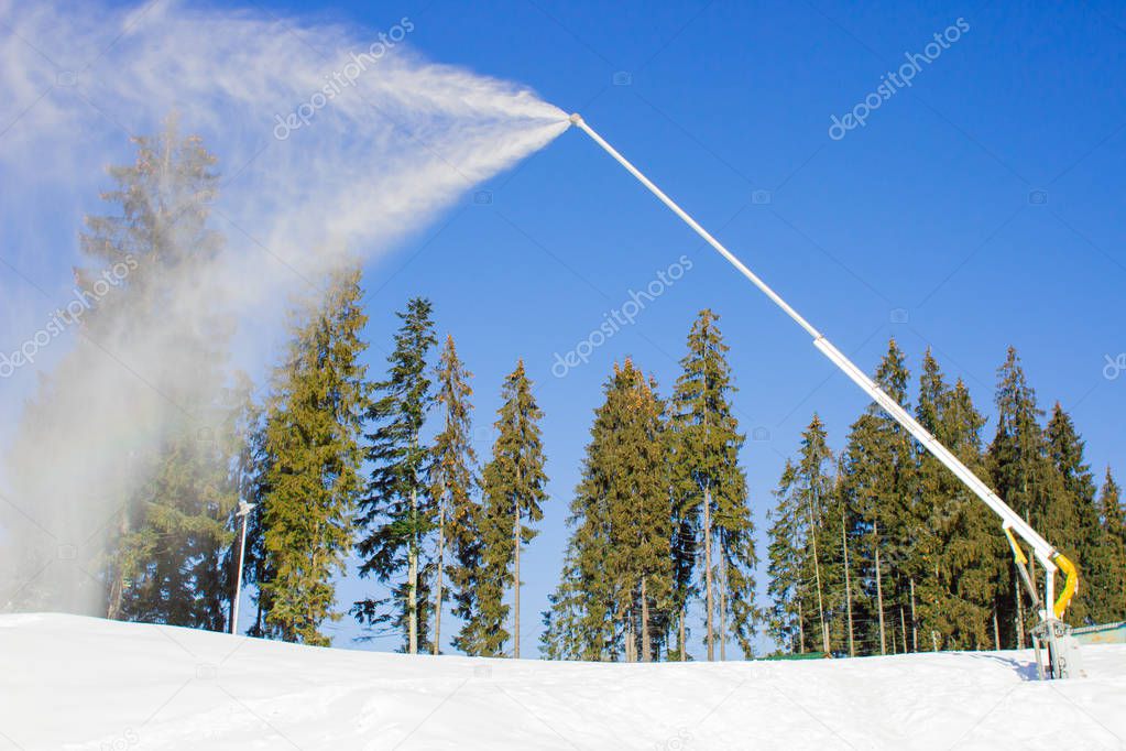 Snowplough at the ski resort. Winter weather. Skiing or snowboarding. Active sport.