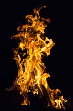 Şeytani alev. Cehennem ateşi. Dilleri ateş dans arka plan. Yangın tehlikesi. Emanet ateş. Tutkulu aşk. Kamp ateşi etrafında güneşlenmek.