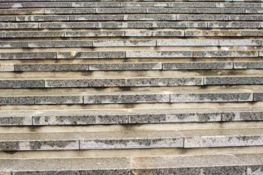 Street steps. Go up. Lots of stairs. Uphill road. Hilly terrain. Stairs to the street. Background from stairs.