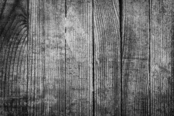 Textured wooden background. Rough wall surface. Country style in the interior. Aged wood. Wooden splash screen. Shabby painted boards. Sawmill theme.