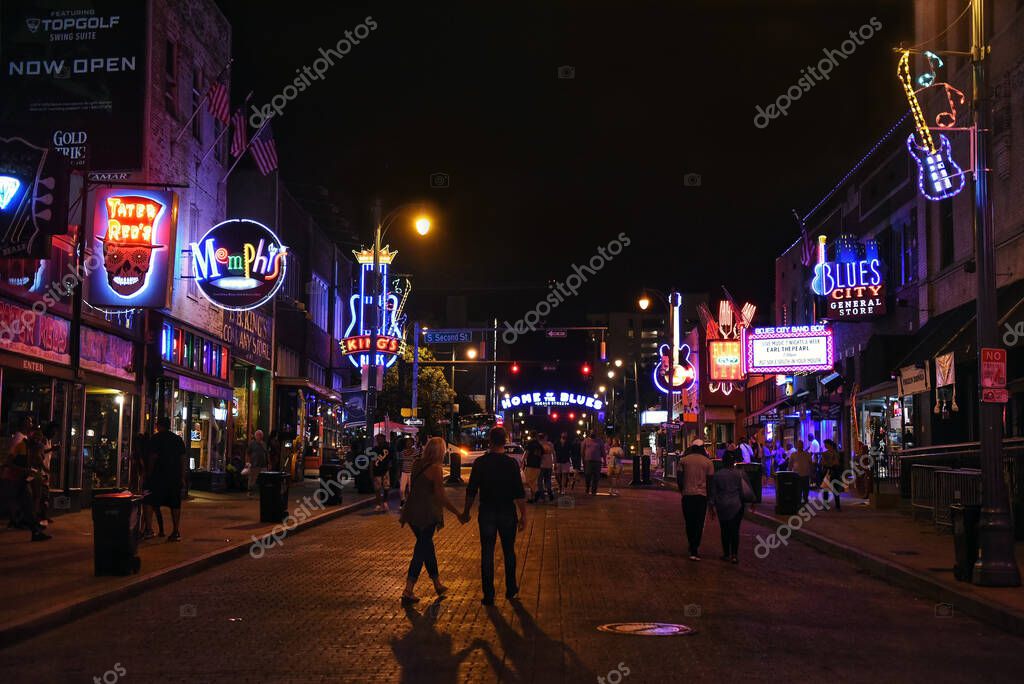 Memphis, TN, USA - September 24, 2019:  The famous Beale Street, with its many neon lights was declared The Home of the Blues by an act of Congress in 1977.  It attracts crowds due its many blues clubs and restaurants.
