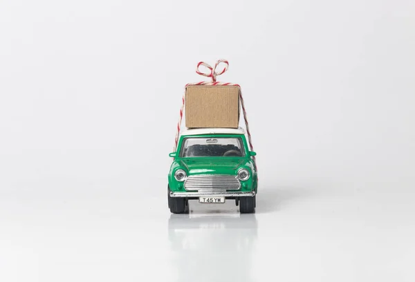 Green travel toy car side on white — Stock Photo, Image