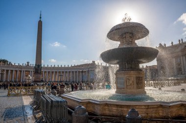 Fountain and obelisk in St. Peter's Square in Vatican, Italy, Europe