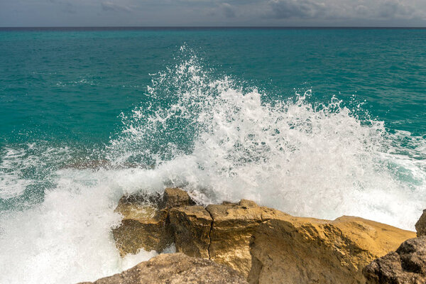 Waves crashing on a rocky shore