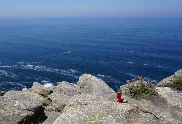 Red Candle Lantern Flame Abandoned Sea Boulders Cape Finisterre — Stok fotoğraf