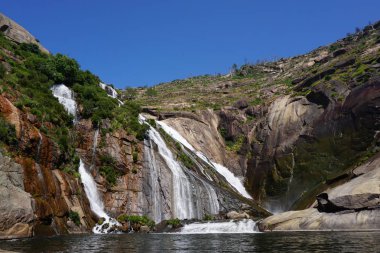 Image of beautiful waterfall among the rocks on Ezaro in Galicia, Spain