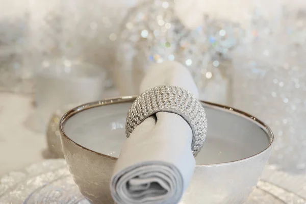 Festive diner decor welcoming guests, glittery glam style