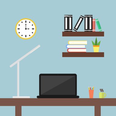 A okul sırası ile bir dizüstü bilgisayar ve ofis masa lambası.
