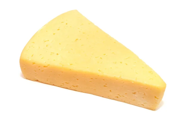 Жесткий сыр на белом — стоковое фото