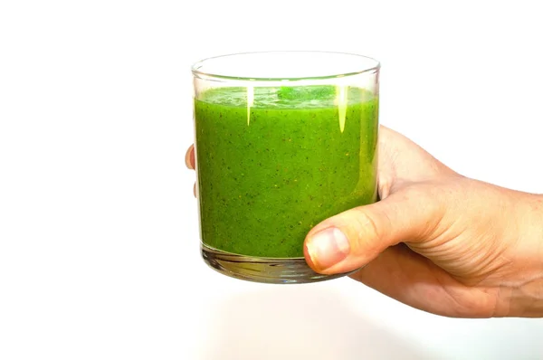 Batido verde de kiwi, plátano y manzana en la mano — Foto de Stock