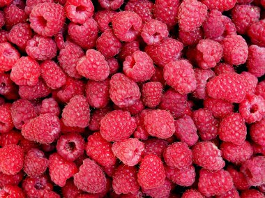 Arka plan olarak kırmızı ahududu Olgun meyveleri