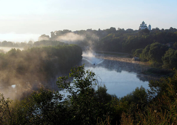 View from high right bank to Desna River and old town in early morning