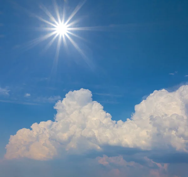 natural background, sparkle sun above a cumulus clouds