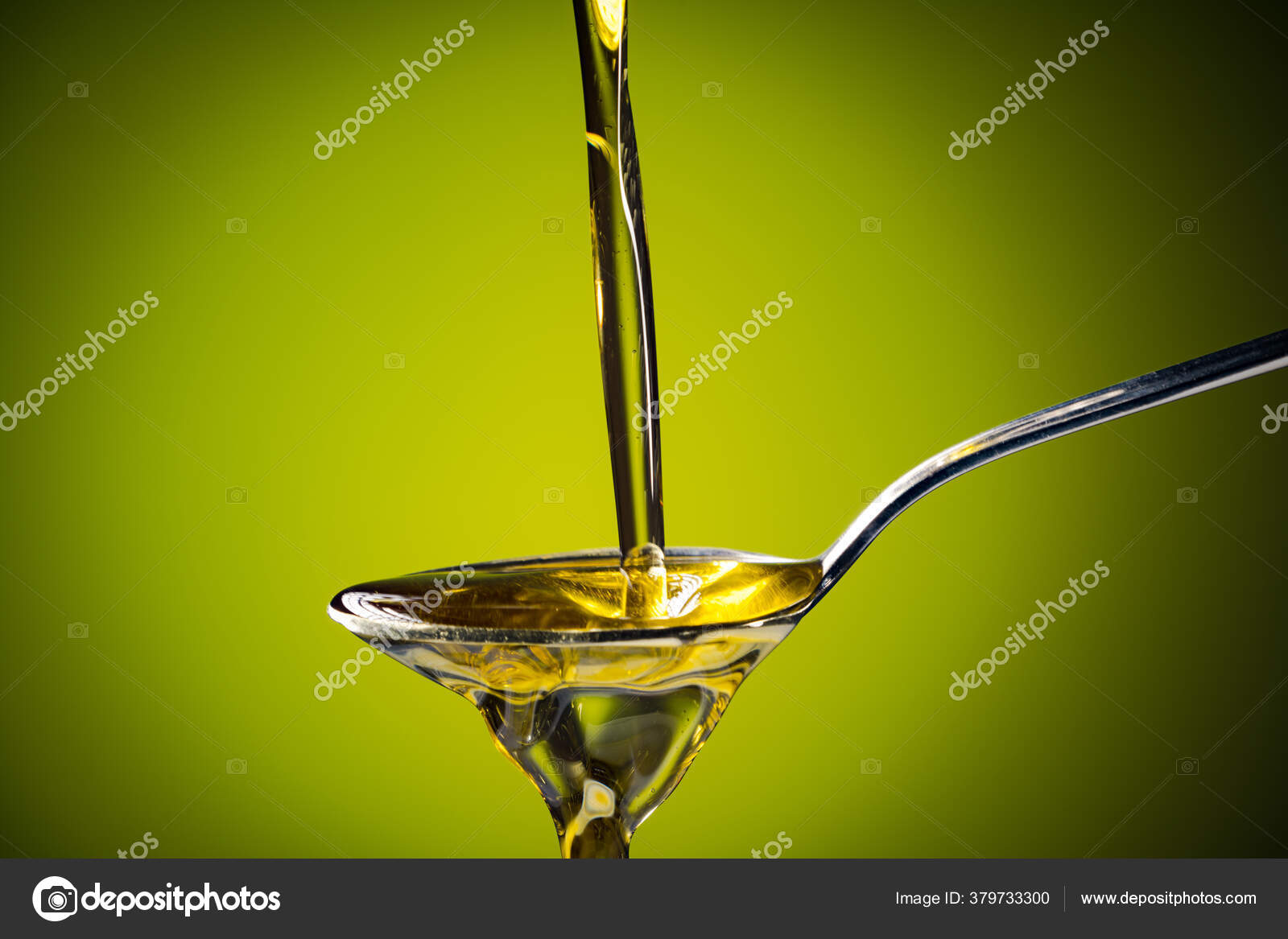Olive Oil Flowing Spoon — Stock Photo © banusevim 379733300