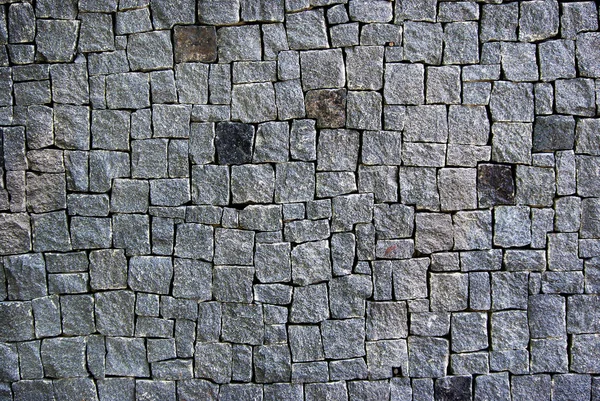 石壁テクスチャの背景 灰色の花崗岩ブロックの壁 — ストック写真