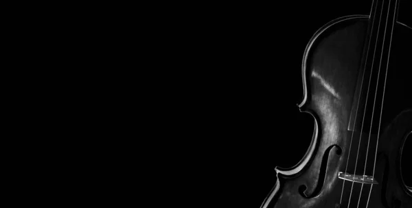 Fragment of a violin on a black background. Concert poster for classical music. Music concept. black and white.