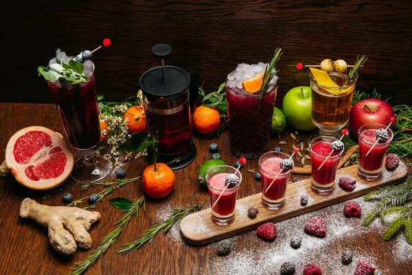 Raspberry Shot Cocktails Fir Cones Citrus Cocktails Wooden Desk Table — Stock Photo, Image