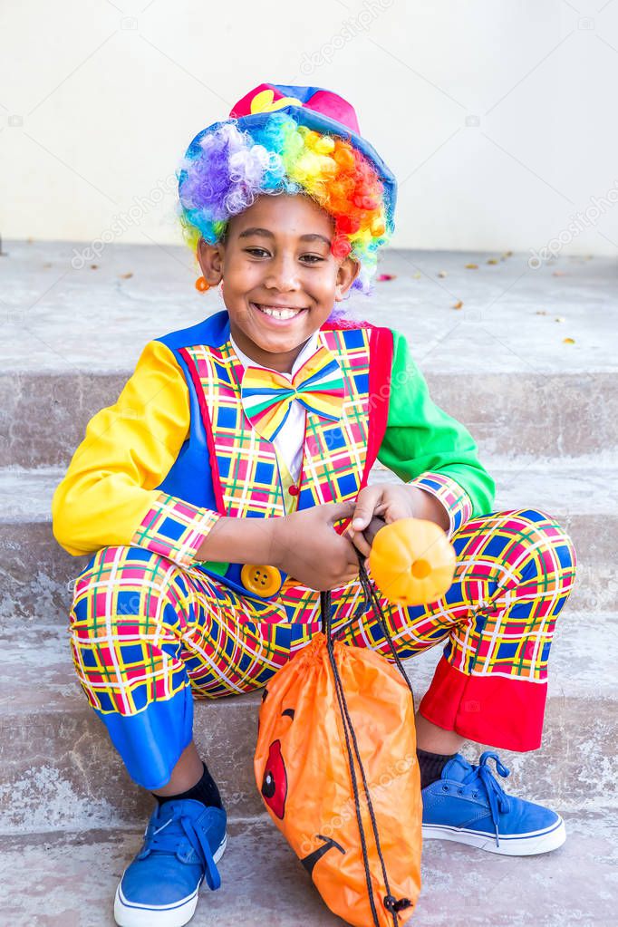 Cute preteen boy in costume ready to trick or treat