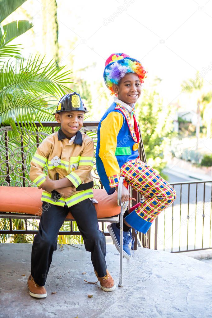 Boys in costume ready to trick or treat