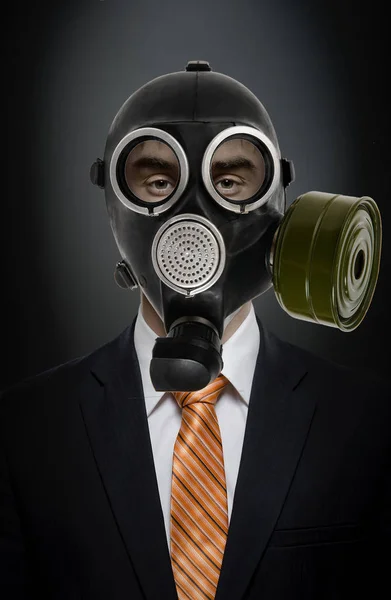 Businessman in gas mask — 스톡 사진